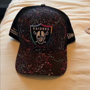 New Era Black Raiders Cap with Colorful Splatter